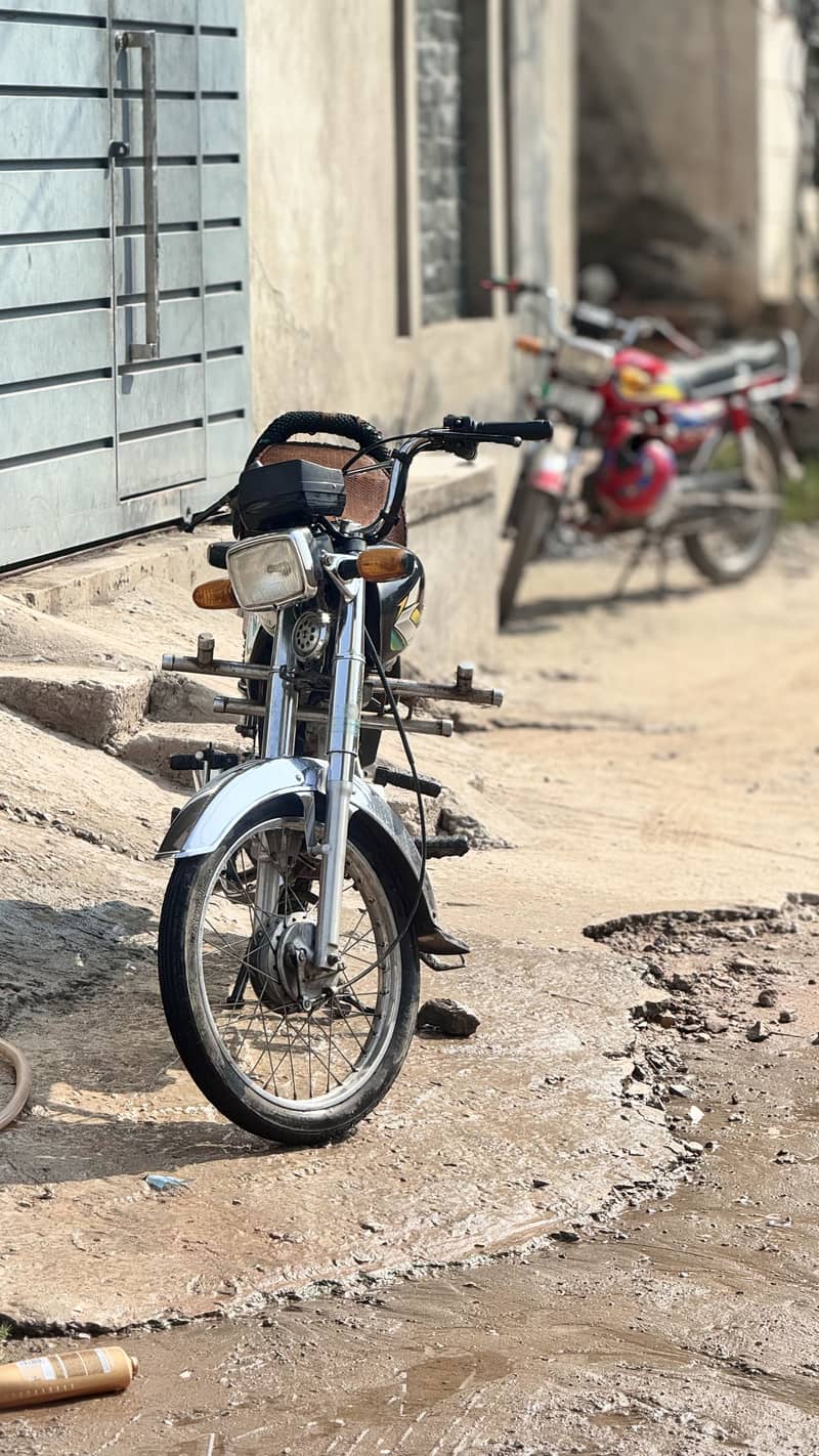 United 70cc 1