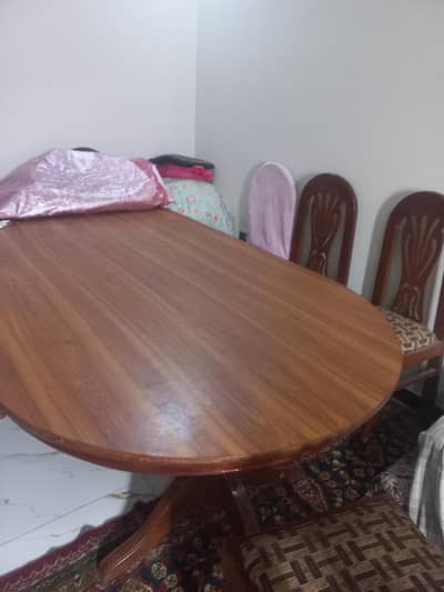 Dining table with 8 chairs .