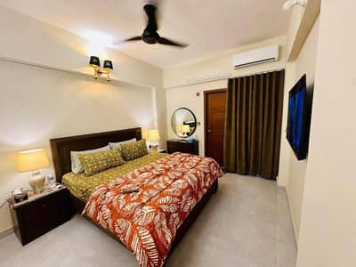 Daily Basis Apartment & Rooms Per day Perweek Short stay Available in E-11 Islamabad