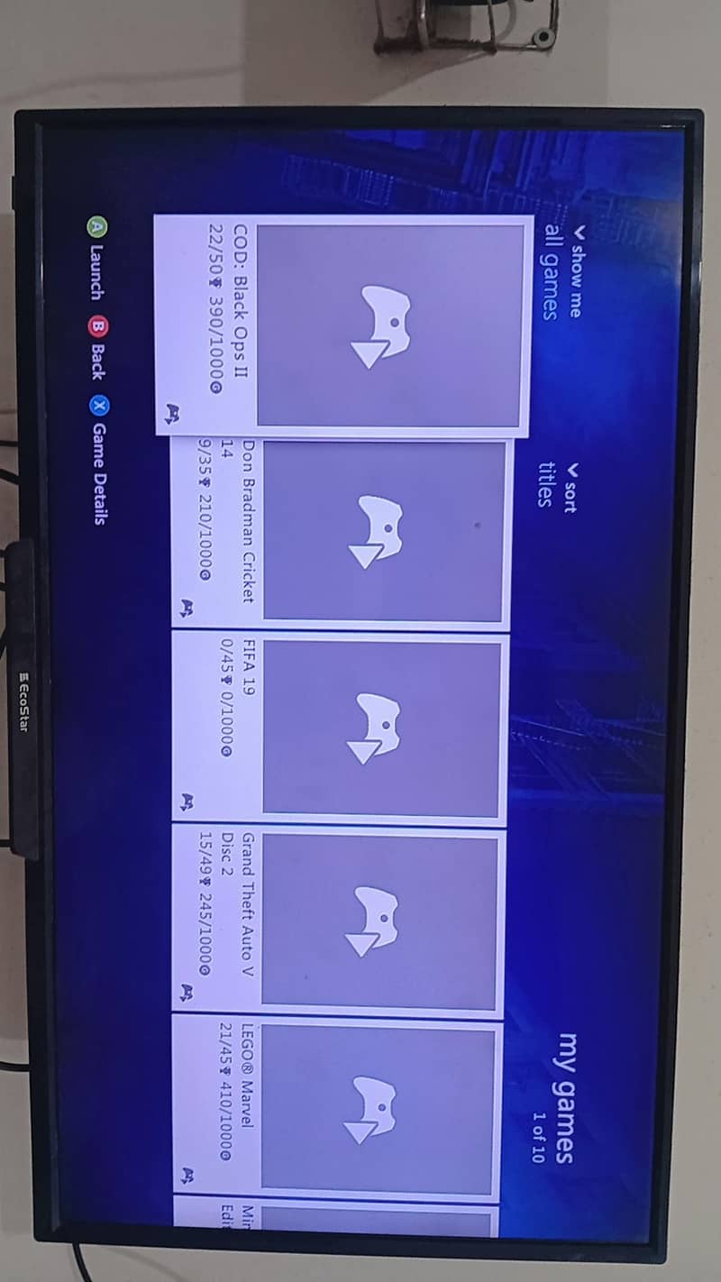 Xbox 360 e with 31 games 8