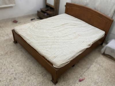 Wooden Double bed urgent for sale.