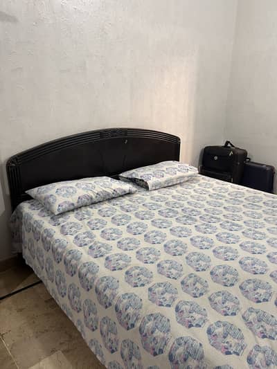 Bed with two side tables