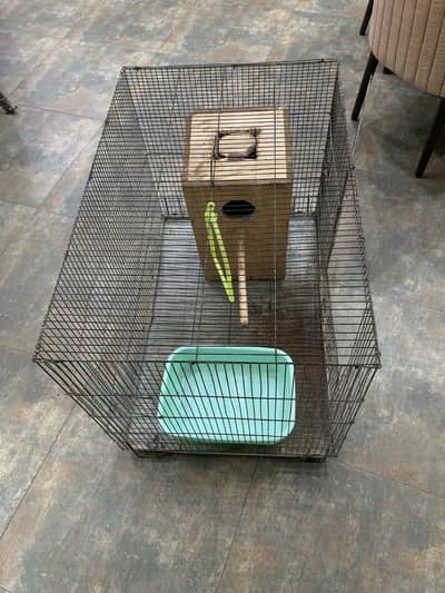 cage with wooden box