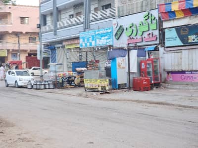 SHOP IN SECTOR Z MAIN 70FT ROAD Main Market NEAR SHAFIQ HOTEL SIZE 14 BY 25 FEET Glass installed on front