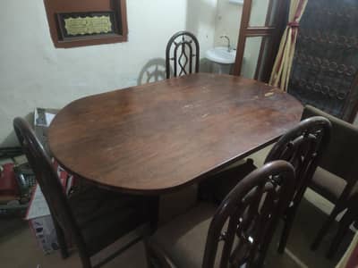 Wooden dining table with 6 chairs