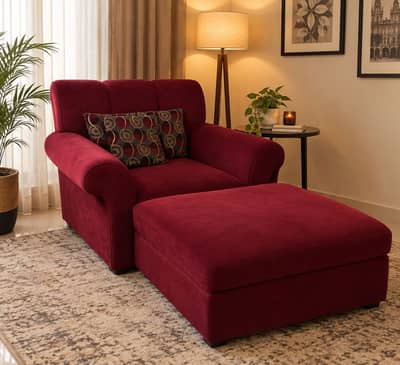 Elegant 1 seater burgundy sofa with matching ottoman