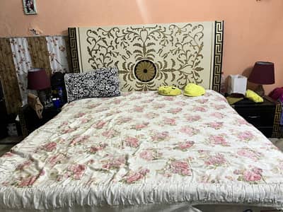 Bed with side table and dressing table