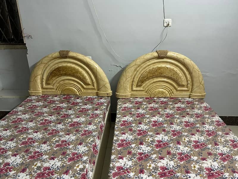 2 single beds 2 side tables 3