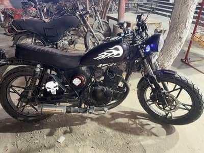 Suzuki 150 converted to cafe racer