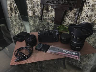 Canon EOS RP Full-Frame Mirrorless Kit - Body + 2 lenses + Adapter