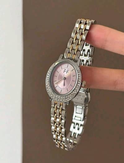 this is gold silver bamboo gurartz watch