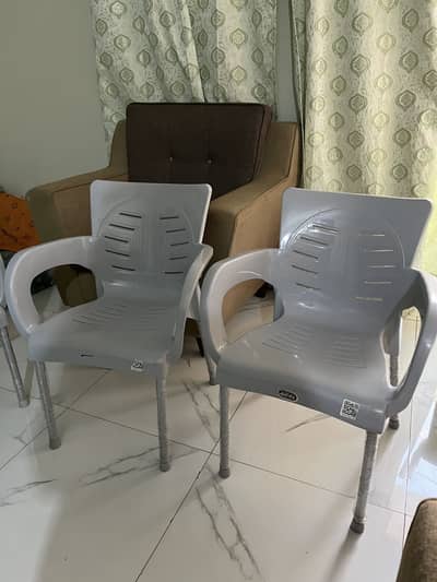 4 Brand New Grey Plastic Chairs