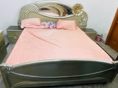dressing with bed and side tables