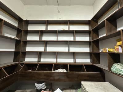 SHOP RACKS AND MAIN COUNTER