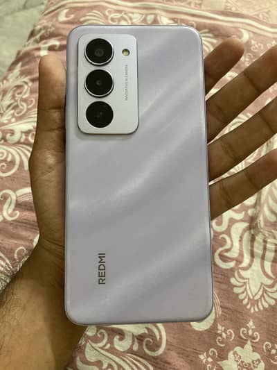 Redmi 15 8/128 7000 mah battery