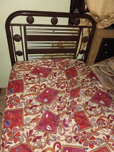 Two single metal beds for sale