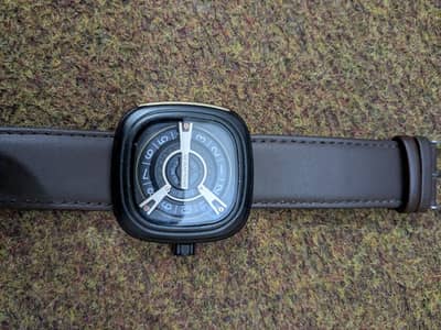 Unique Seven Friday watch with brown strap