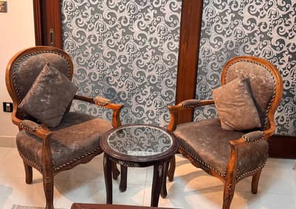 Sofa chairs with a round table