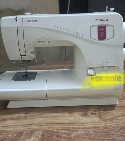Singer sewing and embroidery machine.