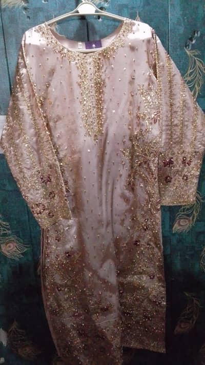 embroidered suit by haseen's brand