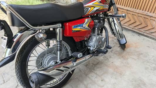 Honda 125 Red color all punjab number