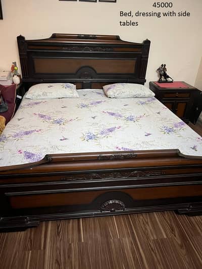 Cusioned and wooden bed set with side table and dressing table