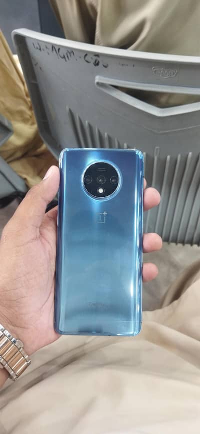 One Plus 7t (6 128)  bilkul ok mobile ha koi fualt nhi zara sa bi