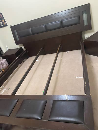 Double bed king size with two side tables and dressing