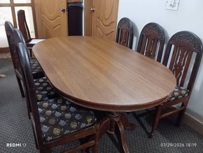 6-Seater Solid Wood Oval Dining Table Set with MoltyFoam Cushions.