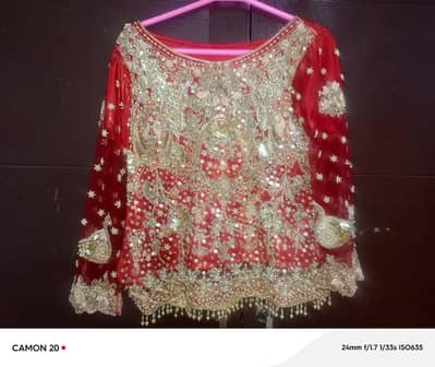 Red lehnga with heavy golden zari work