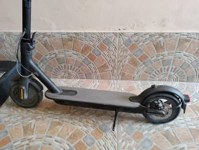 MI electric scooty, range 20 km imported