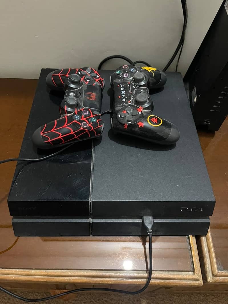 PS4 with two controllers 1