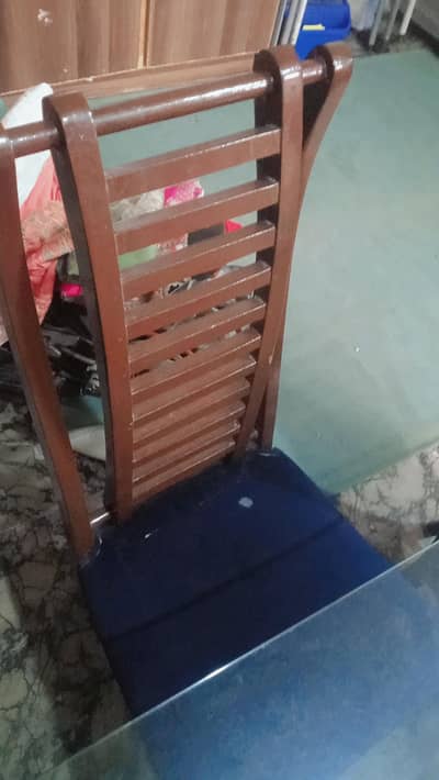 glass top dining table with 6 chairs neat and clean condition