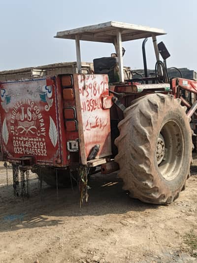 385 bucket tractor