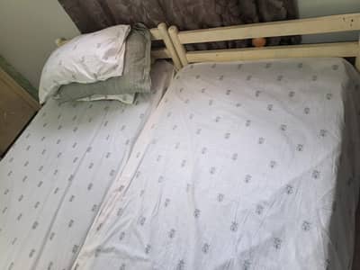 2 used iron bed  with 2 new matress