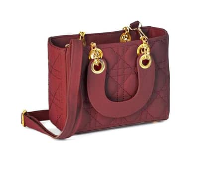 Maroon qualited crossbody bag for girl with gold hardware