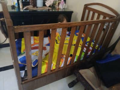 Premium baby cot with rocking feather + storage +side table