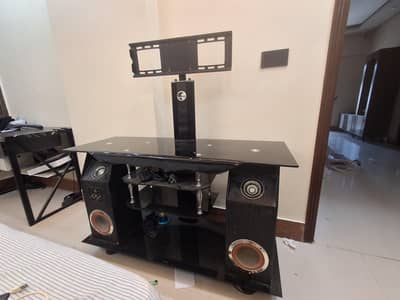 tv table with attached speaker