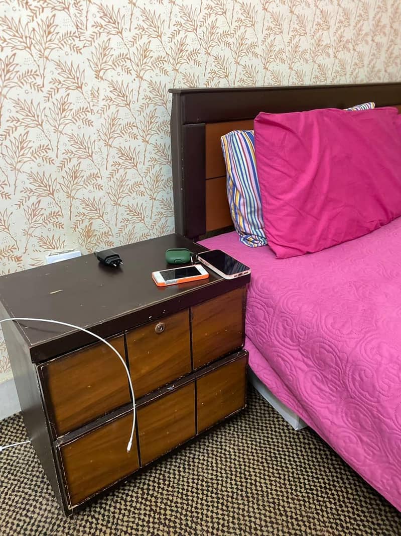 bed with one side table 2