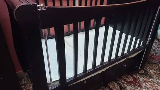 Original Mothercare wooden baby cot available for sale.