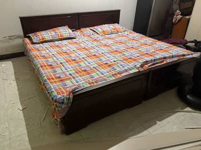 2 single bed (Without Mattress)