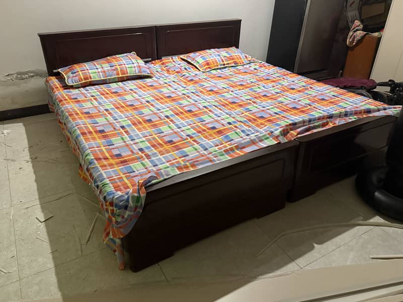 2 single bed (Without Mattress) 0