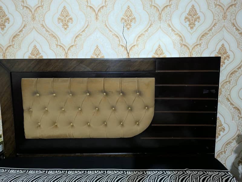 large size bed with a side table. 1