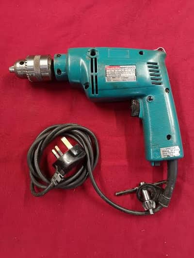 Drill machine (Makita nhp 1300s)