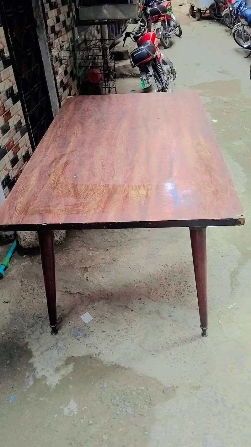 safealmare with dining table good condition 3
