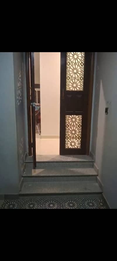 Prime Location 1900 Square Yards Spacious Upper Portion Is Available In Khalid Bin Walid Road For rent