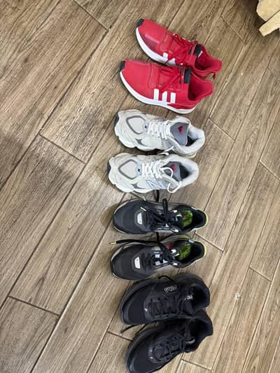 puma addidas new balance fila