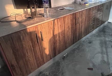 Cabinets nd draws plus top marble shelf