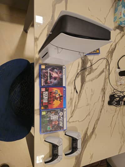 Almost Brand New PS5 Slim Console + 2 Controllers + 4 Games