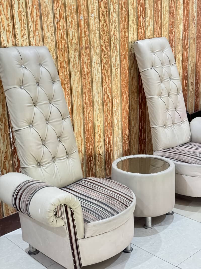 2 sofa chairs one sofa table 1